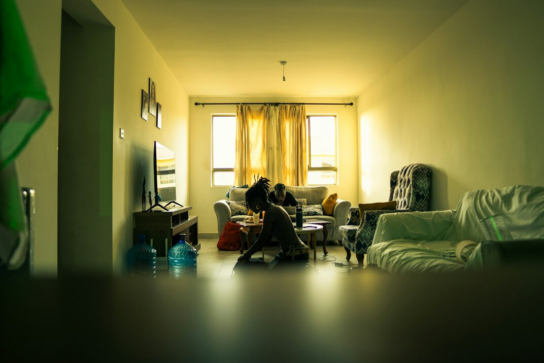 person thinking alone in room
