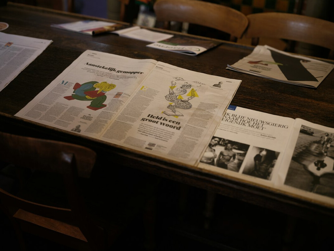 newspaper headlines on table