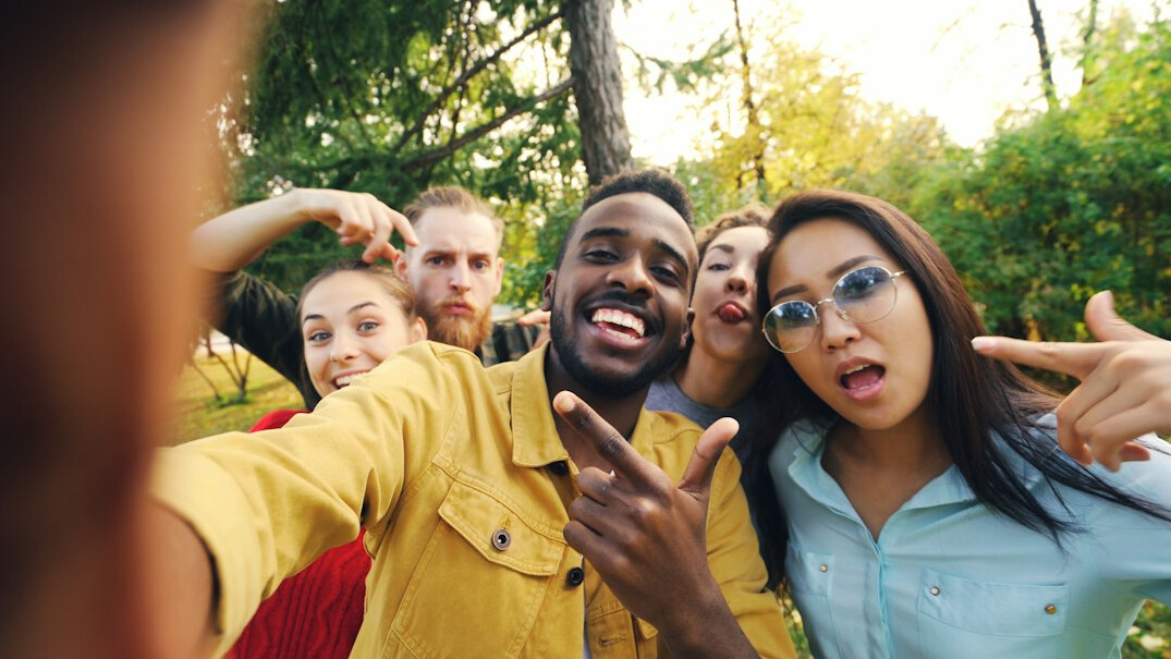 group of friends taking selfie
