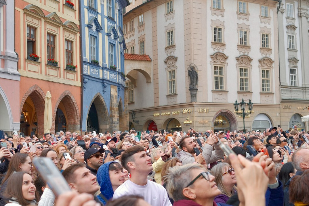 crowd gathering in city square